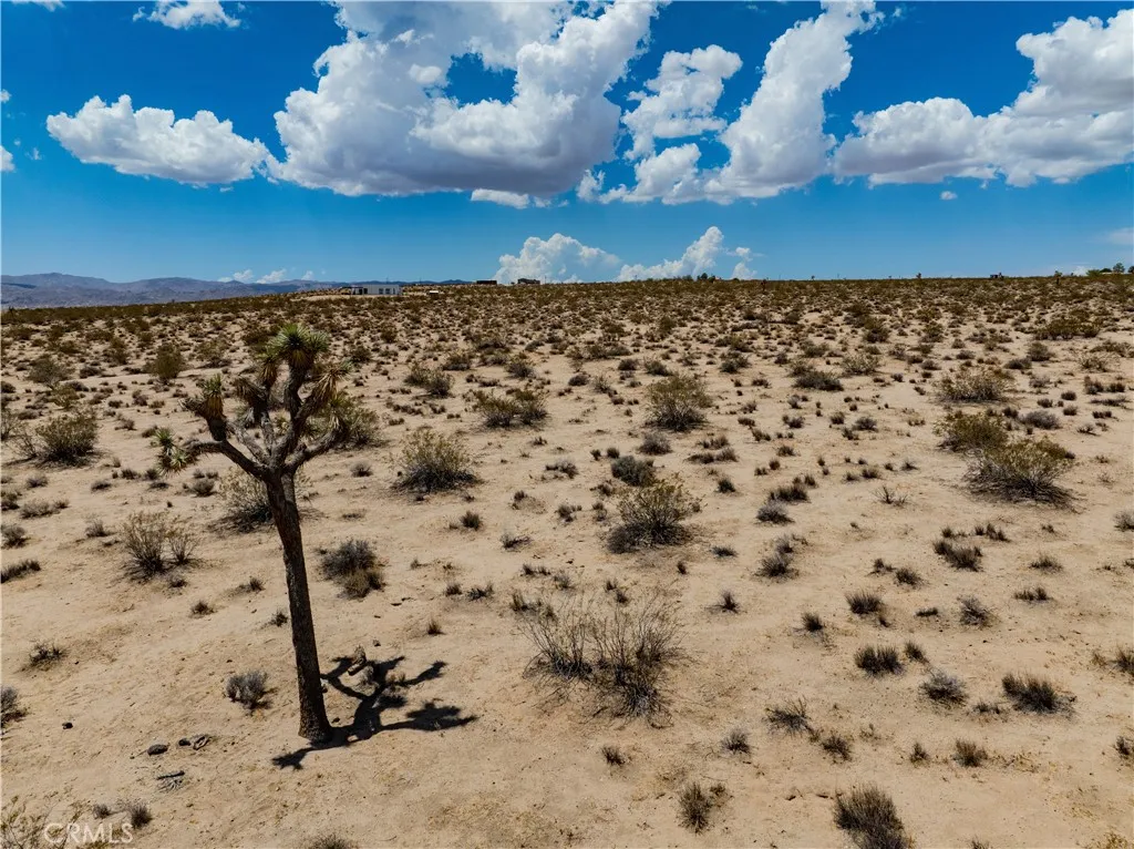 63840 Desert Lilly Road Joshua Tree, CA 92252 - Photo 28 of 34 a view of a sky view of building