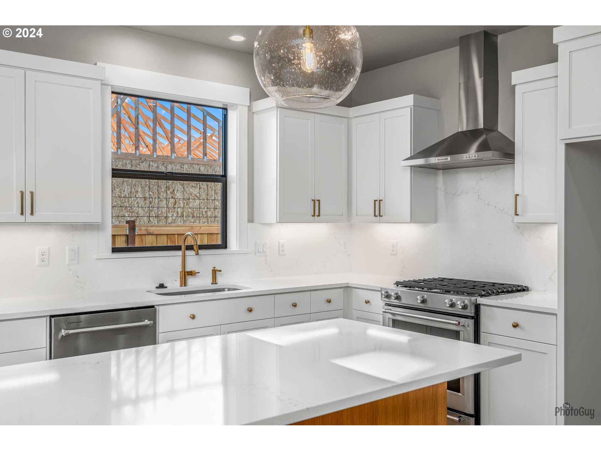 32748 Coburg Road Eugene, OR 97408 - Photo 12 of 35 a kitchen with stainless steel appliances granite countertop a sink stove and cabinets