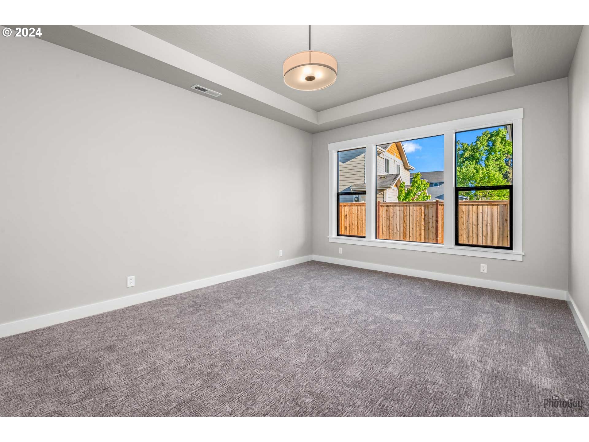 32748 Coburg Road Eugene, OR 97408 - Photo 23 of 35 a view of an empty room with a window