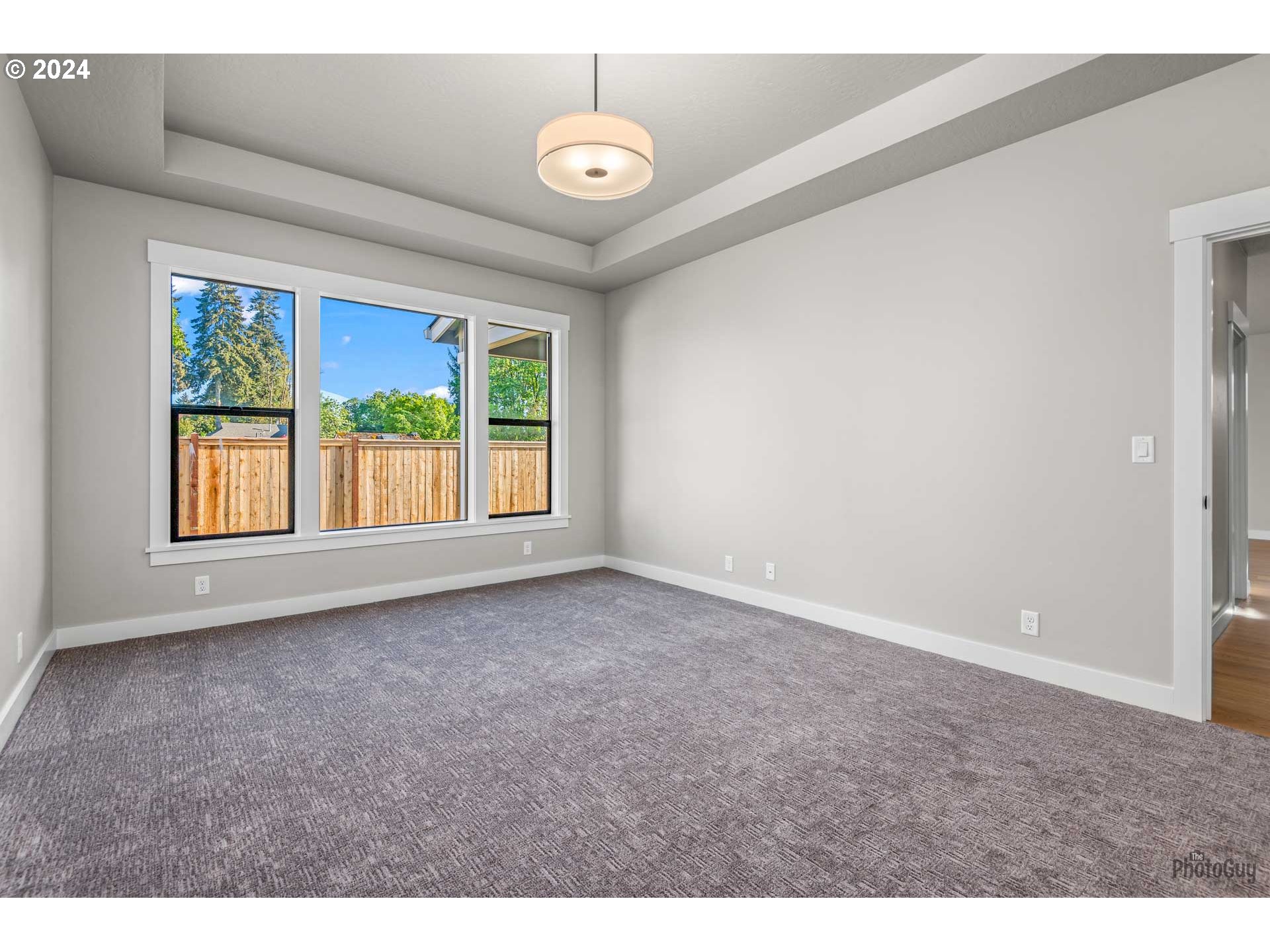 32748 Coburg Road Eugene, OR 97408 - Photo 24 of 35 a view of an empty room with a window