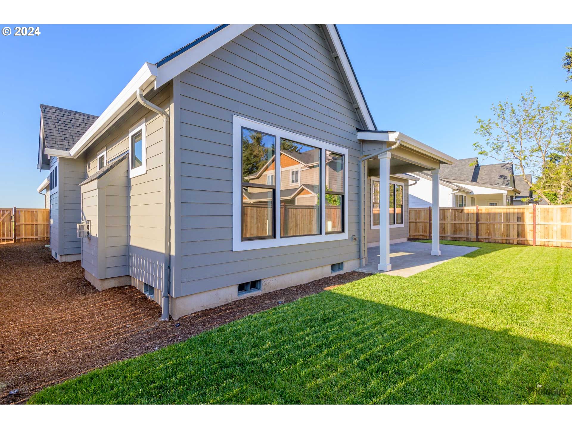 32748 Coburg Road Eugene, OR 97408 - Photo 34 of 35 a view of an house with backyard porch and furniture