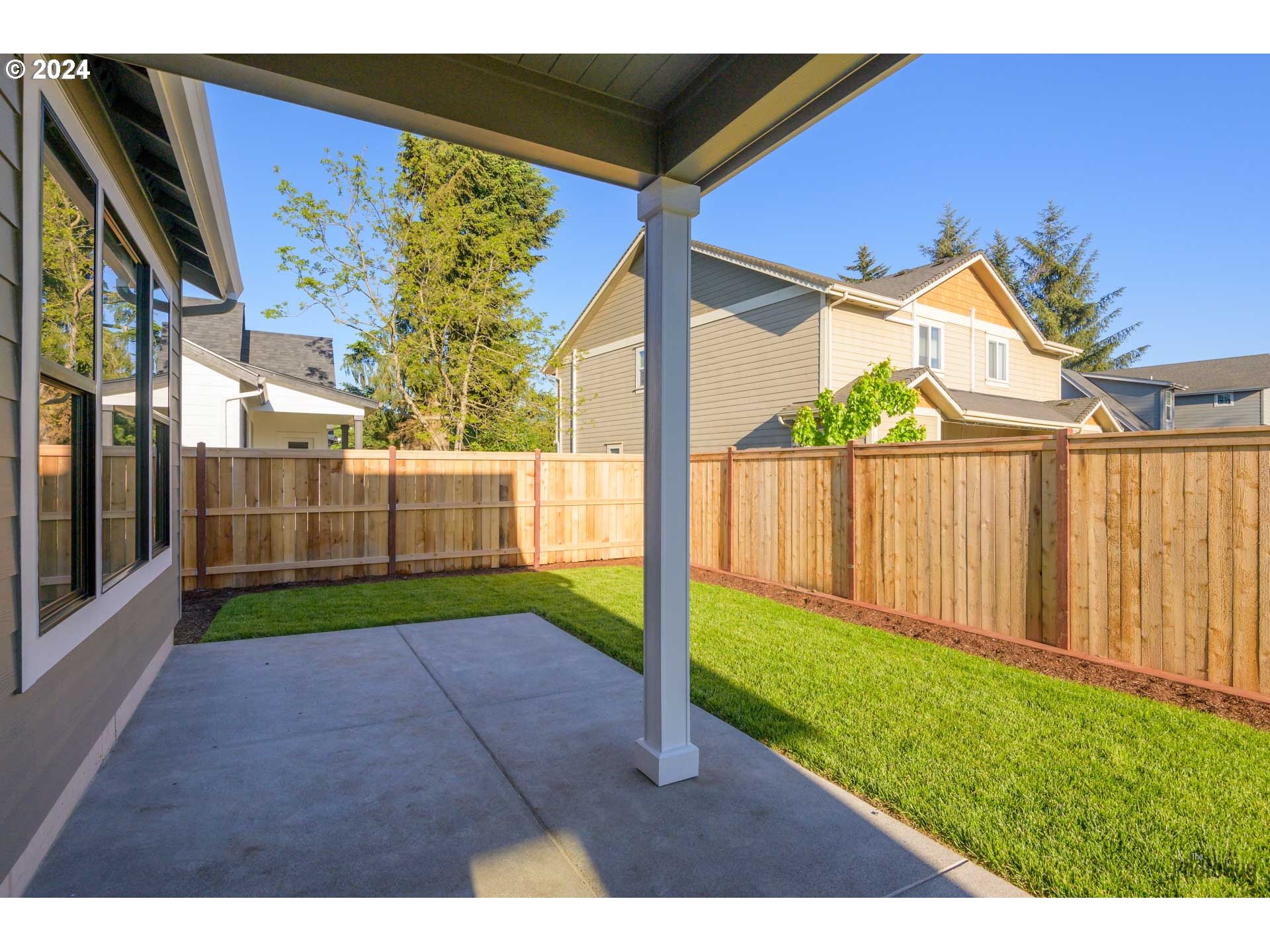 32748 Coburg Road Eugene, OR 97408 - Photo 35 of 35 a view of backyard with a garden and deck