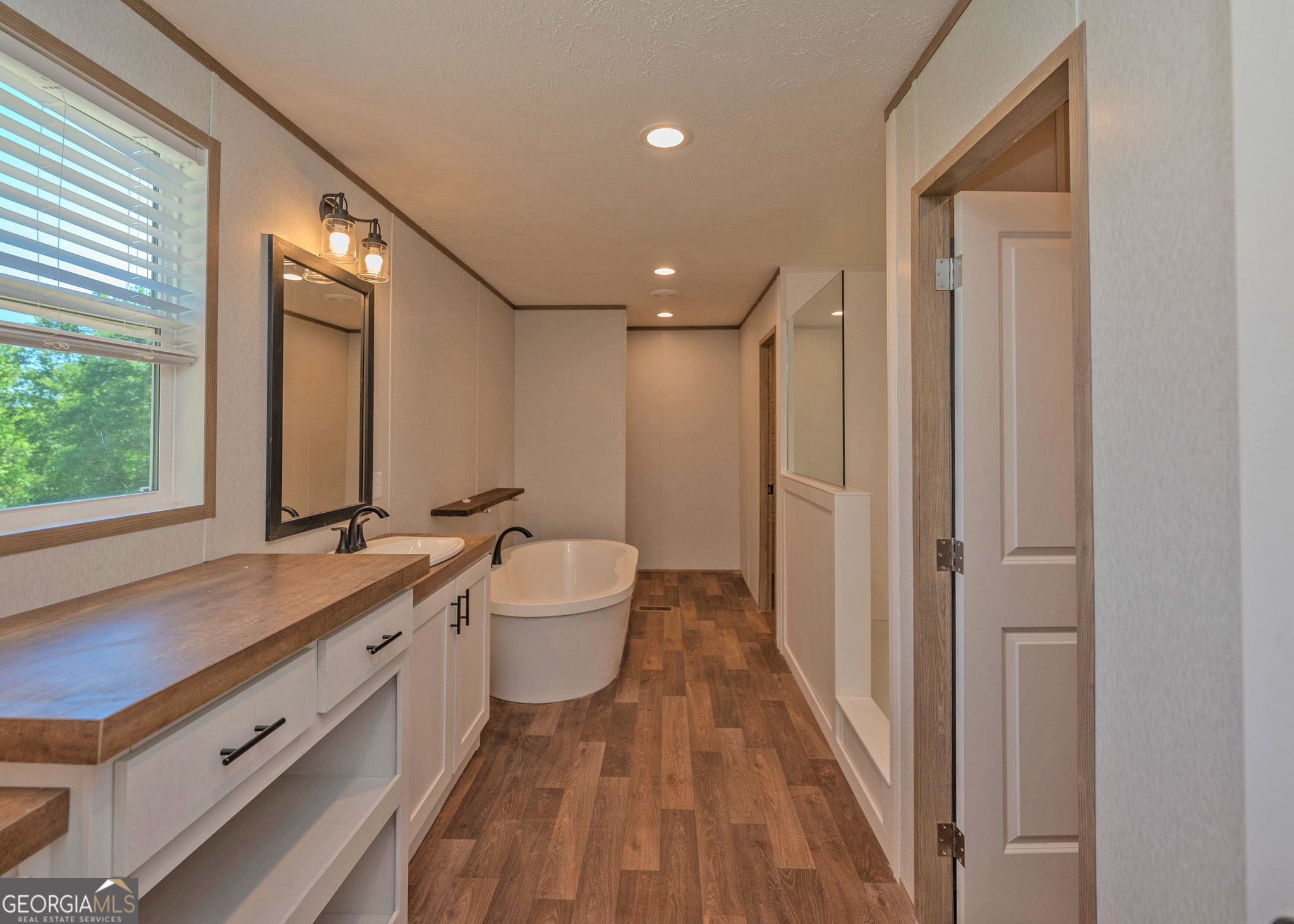 413 Griffin Road Martin, GA 30557 - Photo 15 of 31 a bathroom with a sink and a mirror