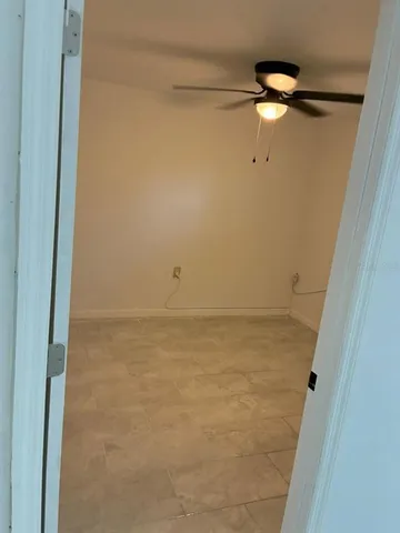 a view of small space with racks on the wall