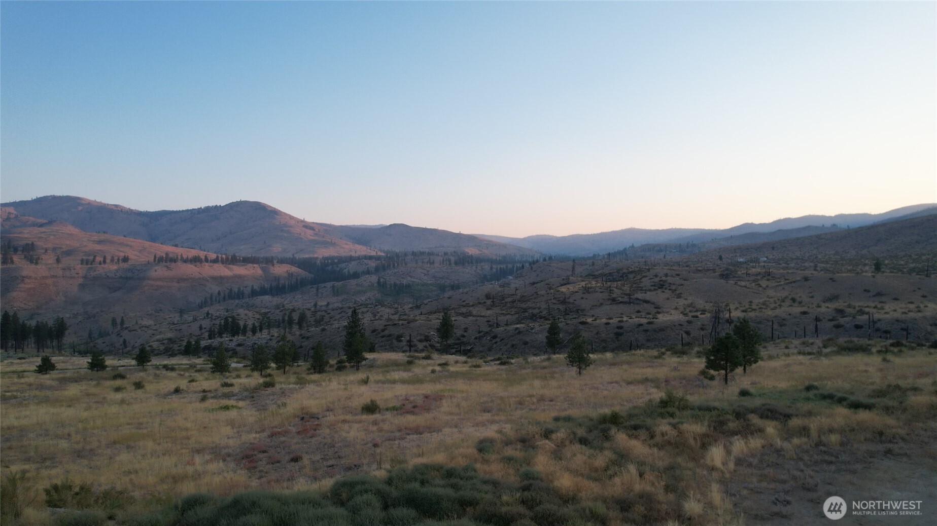 15 Sawtooth View Road Pateros, WA 98846 - Photo 21 of 21 a view of a dry field with mountains in the background