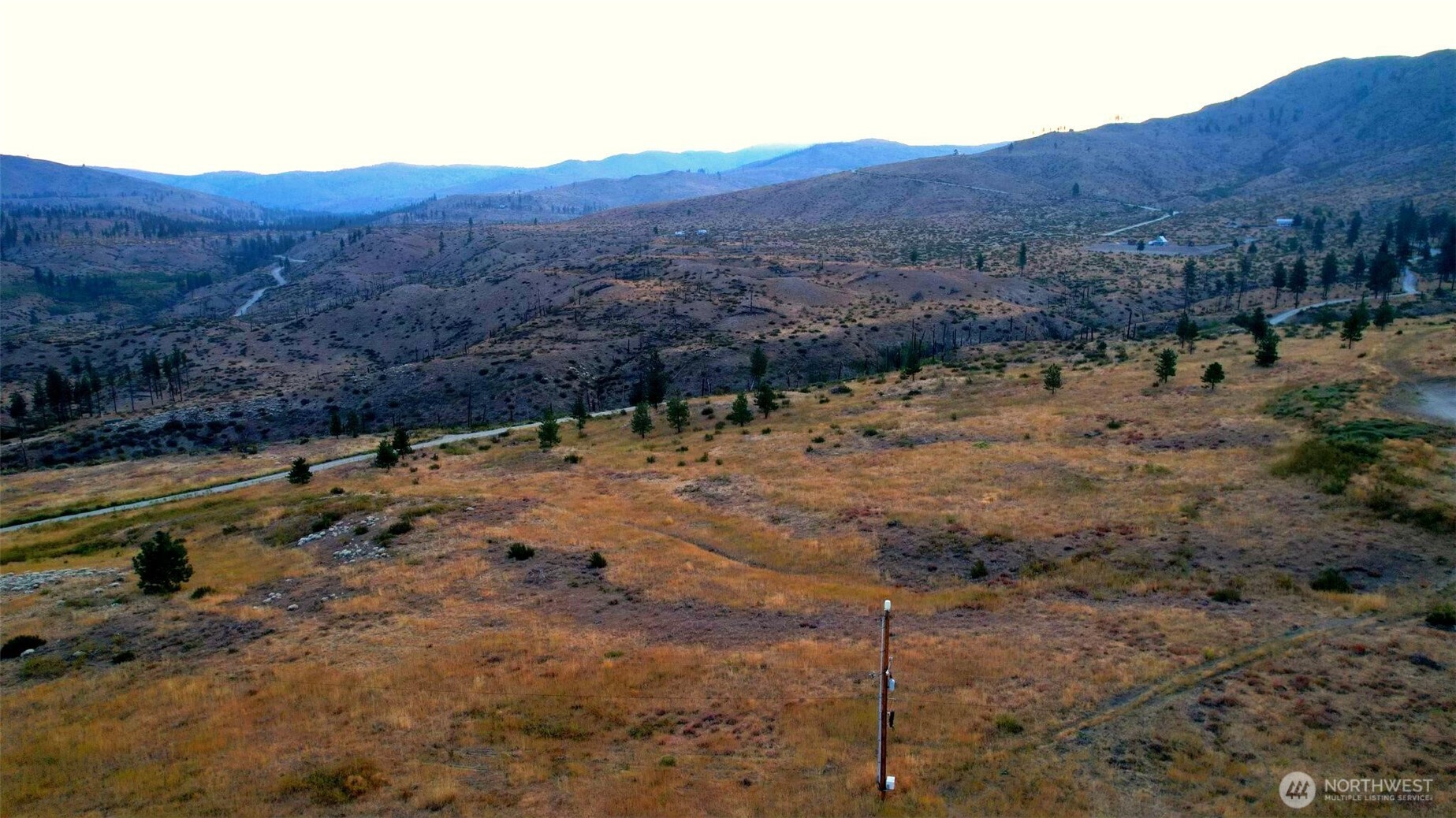 15 Sawtooth View Road Pateros, WA 98846 - Photo 10 of 21 a view of a lake with mountains in the background