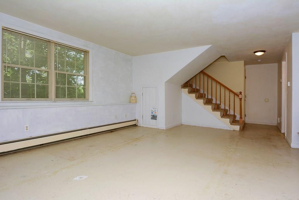 24 1st Street Amesbury, MA 01913 - Photo 19 of 42 a view of an empty room with a window