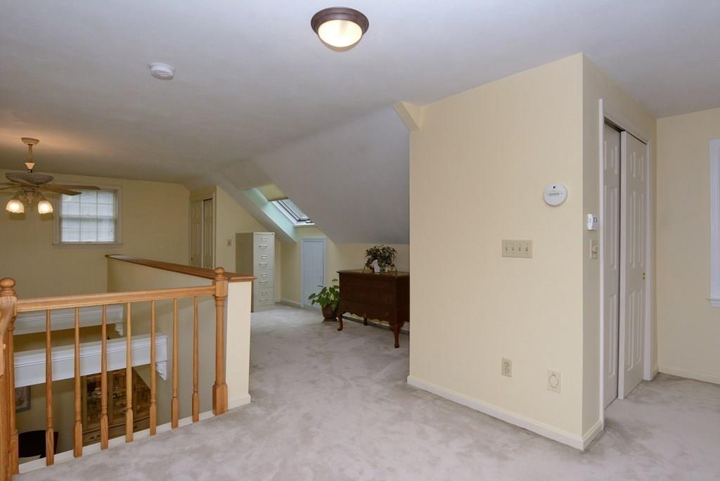 24 1st Street Amesbury, MA 01913 - Photo 20 of 42 a view of livingroom with furniture and windows