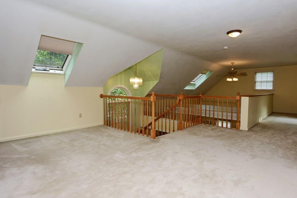 24 1st Street Amesbury, MA 01913 - Photo 24 of 42 a view of a hallway with a room