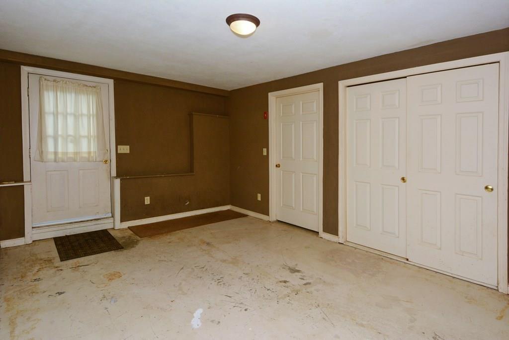 24 1st Street Amesbury, MA 01913 - Photo 30 of 42 an empty room with closet area