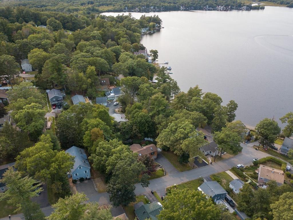 24 1st Street Amesbury, MA 01913 - Photo 40 of 42 an aerial view of a house with a yard
