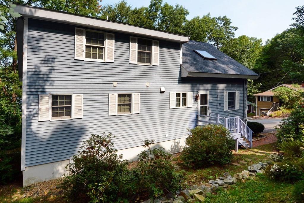24 1st Street Amesbury, MA 01913 - Photo 41 of 42 a view of a house with a yard