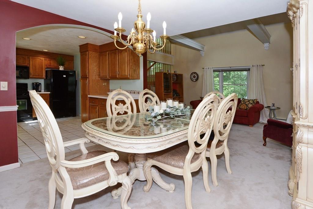 24 1st Street Amesbury, MA 01913 - Photo 6 of 42 a view of a dining room with furniture