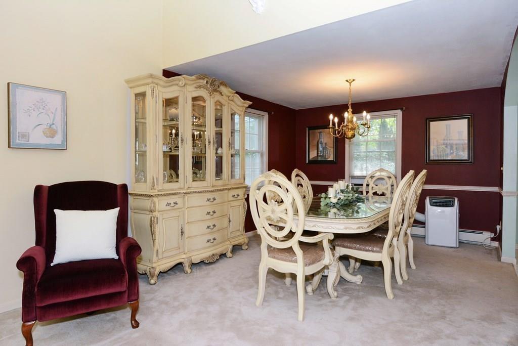 24 1st Street Amesbury, MA 01913 - Photo 7 of 42 a dining room with furniture and window