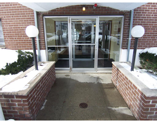 35 Glencoe Street, Unit 43 Boston, MA 02135 - Photo 17 of 19 a view of balcony and patio