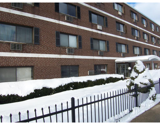 35 Glencoe Street, Unit 43 Boston, MA 02135 - Photo 18 of 19 a view of a brick building