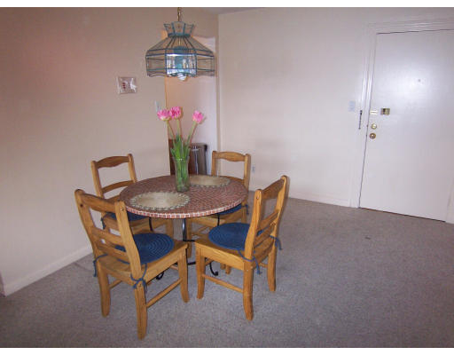 35 Glencoe Street, Unit 43 Boston, MA 02135 - Photo 9 of 19 a view of a dining room with furniture