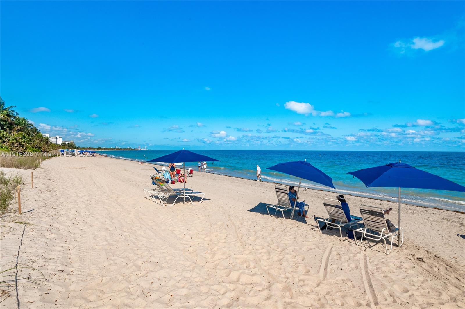 609 Ocean Drive, Unit 10H Key Biscayne, FL 33149 - Photo 5 of 21 a view of a swimming pool and an outdoor space