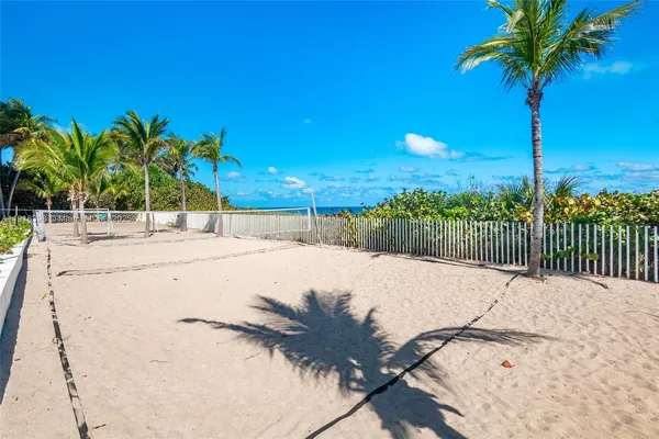 a view of a backyard of the house