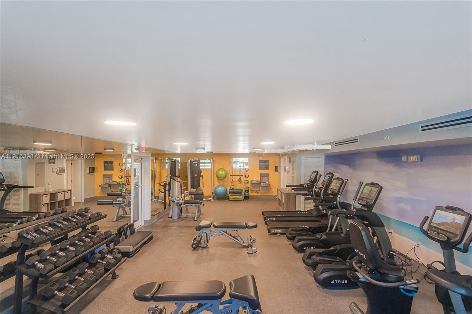 609 Ocean Drive, Unit 10H Key Biscayne, FL 33149 - Photo 8 of 21 a view of a room with gym equipment