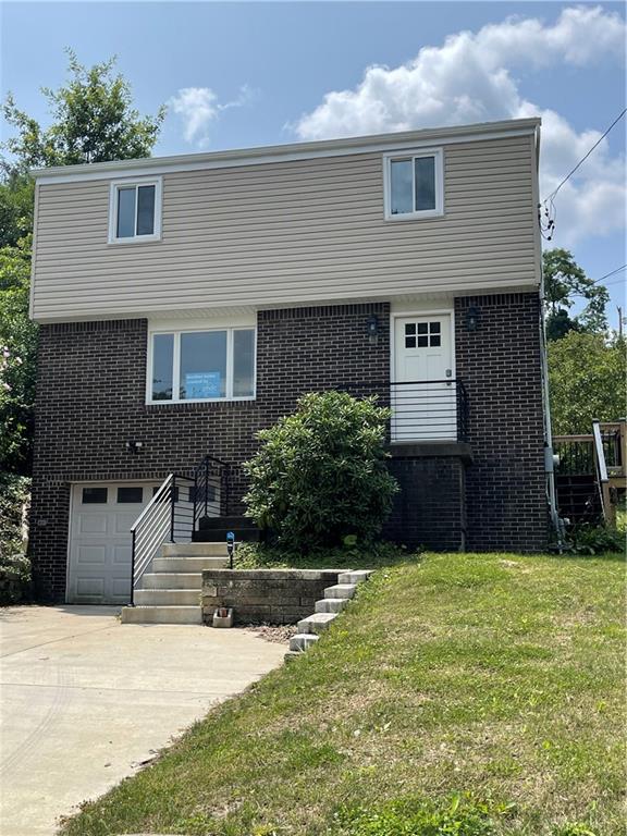 a house view with a outdoor space
