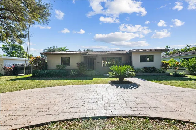 a view of a house with a patio