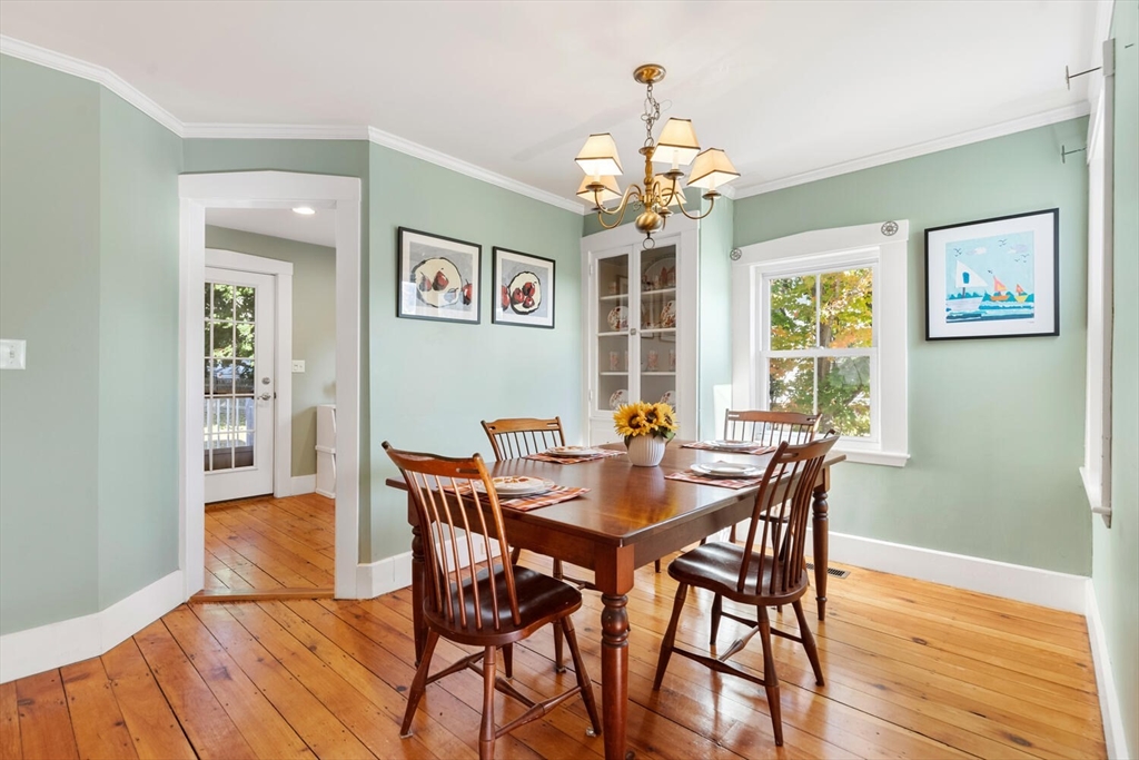100 Willow Street Hamilton, MA 01982 - Photo 17 of 35 a view of a dining room with furniture window and wooden floor