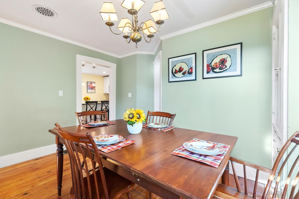 100 Willow Street Hamilton, MA 01982 - Photo 18 of 35 a view of a dining room with furniture and wooden floor