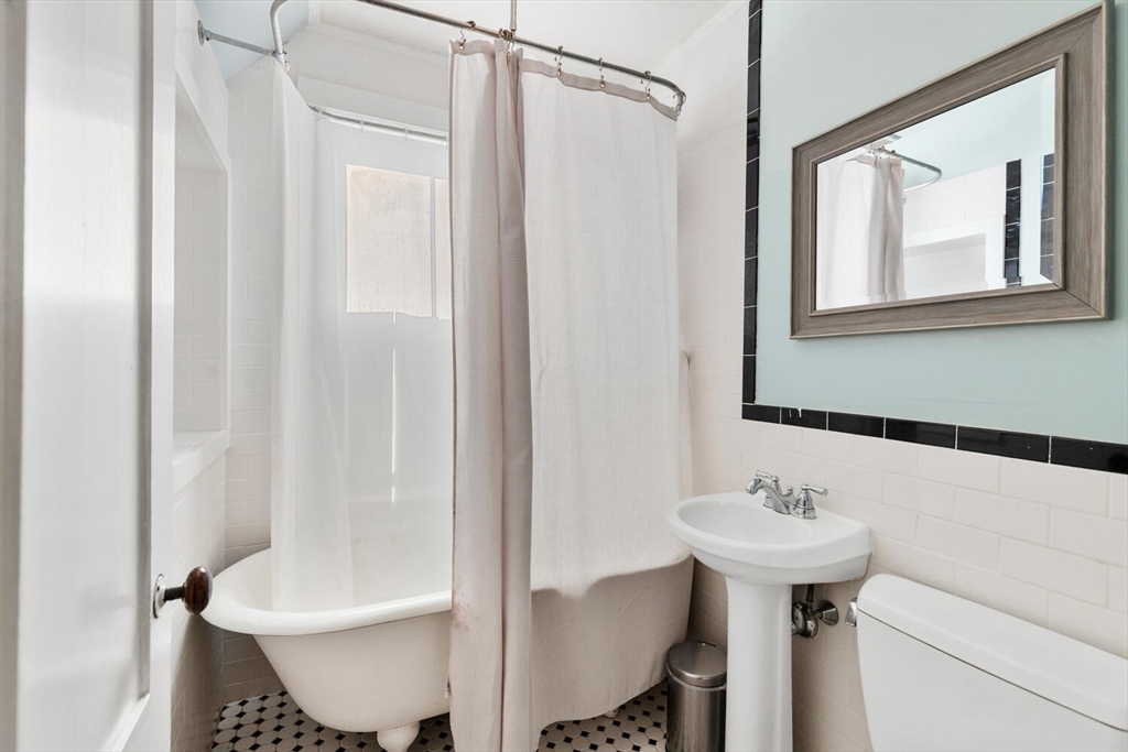 100 Willow Street Hamilton, MA 01982 - Photo 24 of 35 a bathroom with a sink toilet and shower