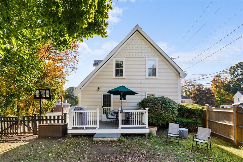 100 Willow Street Hamilton, MA 01982 - Photo 32 of 35 a view of a house with a yard chairs and a table