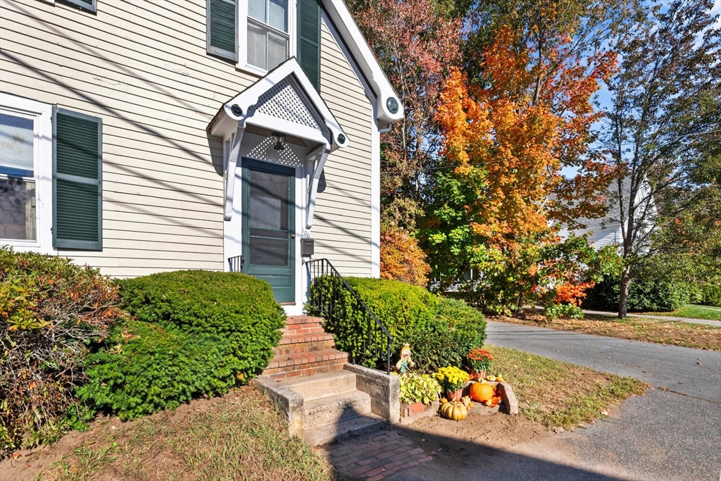 100 Willow Street Hamilton, MA 01982 - Photo 4 of 35 a front view of a house with a yard