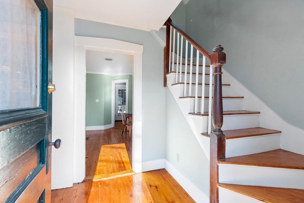 100 Willow Street Hamilton, MA 01982 - Photo 7 of 35 a view of entryway and hall with wooden floor