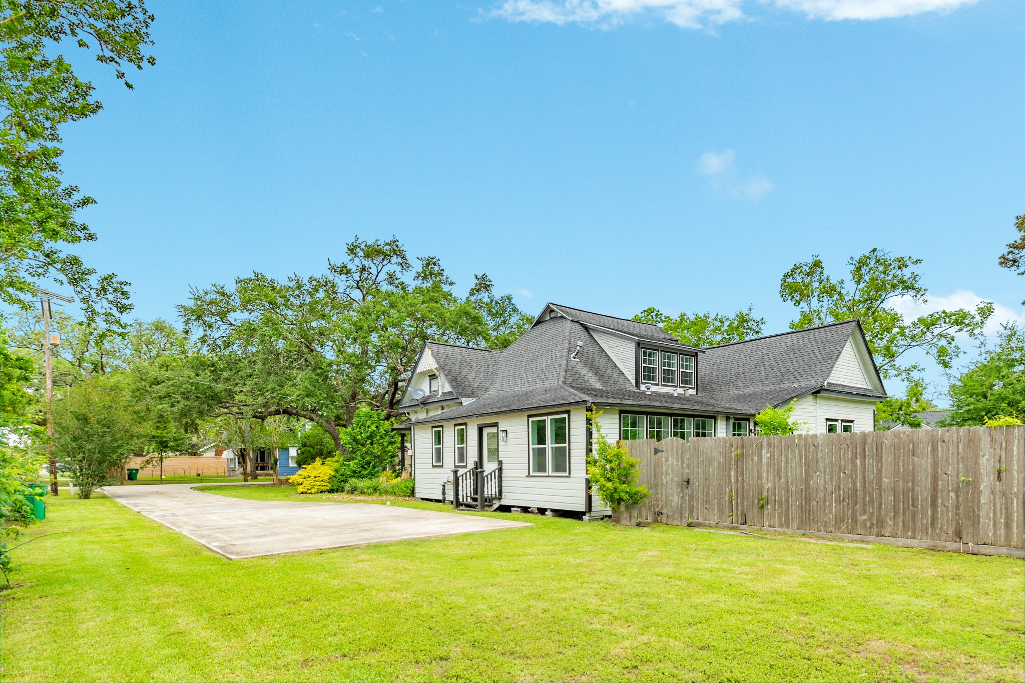 336 North Rockisland Street Angleton, TX 77515 - Photo 30 of 32 a view of a house with a yard