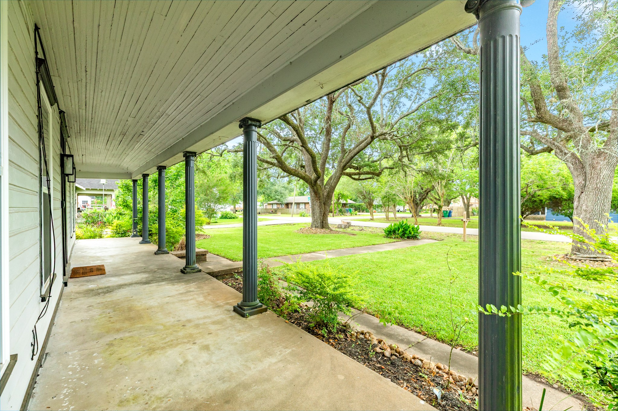 336 North Rockisland Street Angleton, TX 77515 - Photo 9 of 32 a view of a garden with an outdoor space