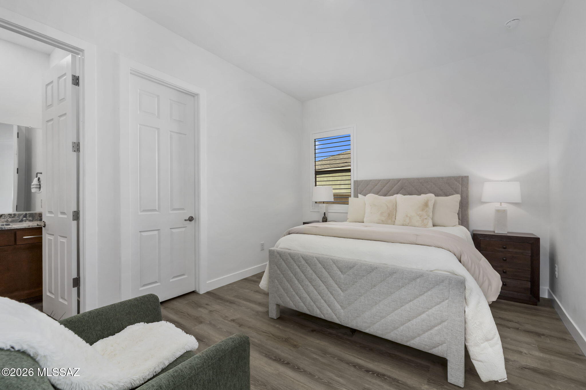 12791 East Tortoise Pointe Drive Vail, AZ 85641 - Photo 32 of 50 a bedroom with a bed and a painting