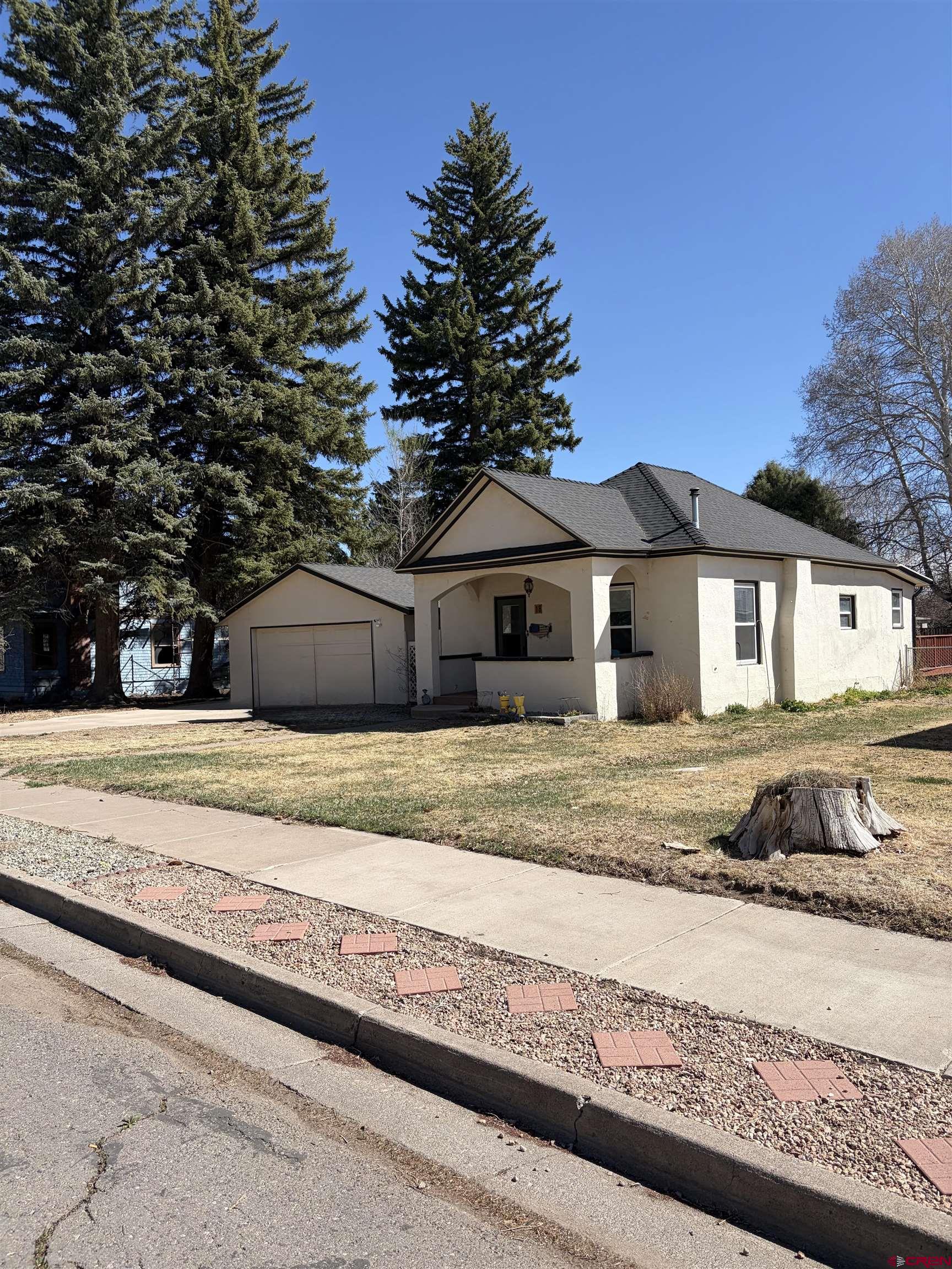 18 Morris Street Monte Vista, CO 81144 - Photo 1 of 14 a house view with a outdoor space