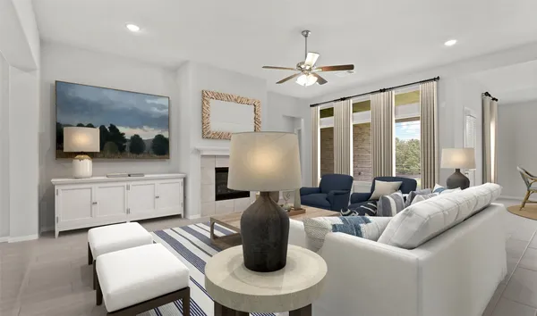 a living room with furniture a chandelier and a flat screen tv