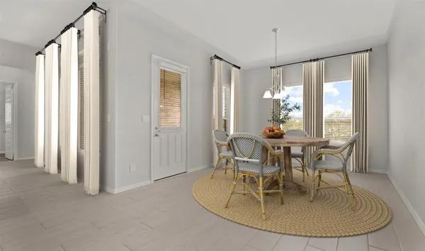 a dining room with furniture and window