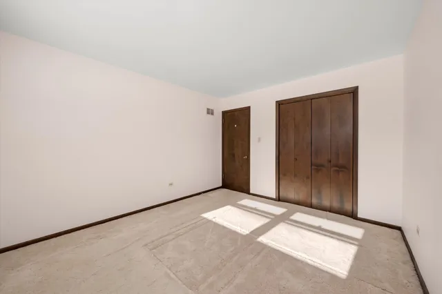 an empty room with closet