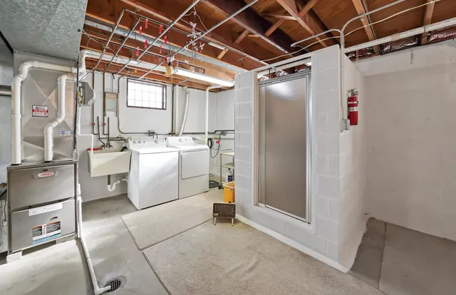 a utility room with dryer and washer