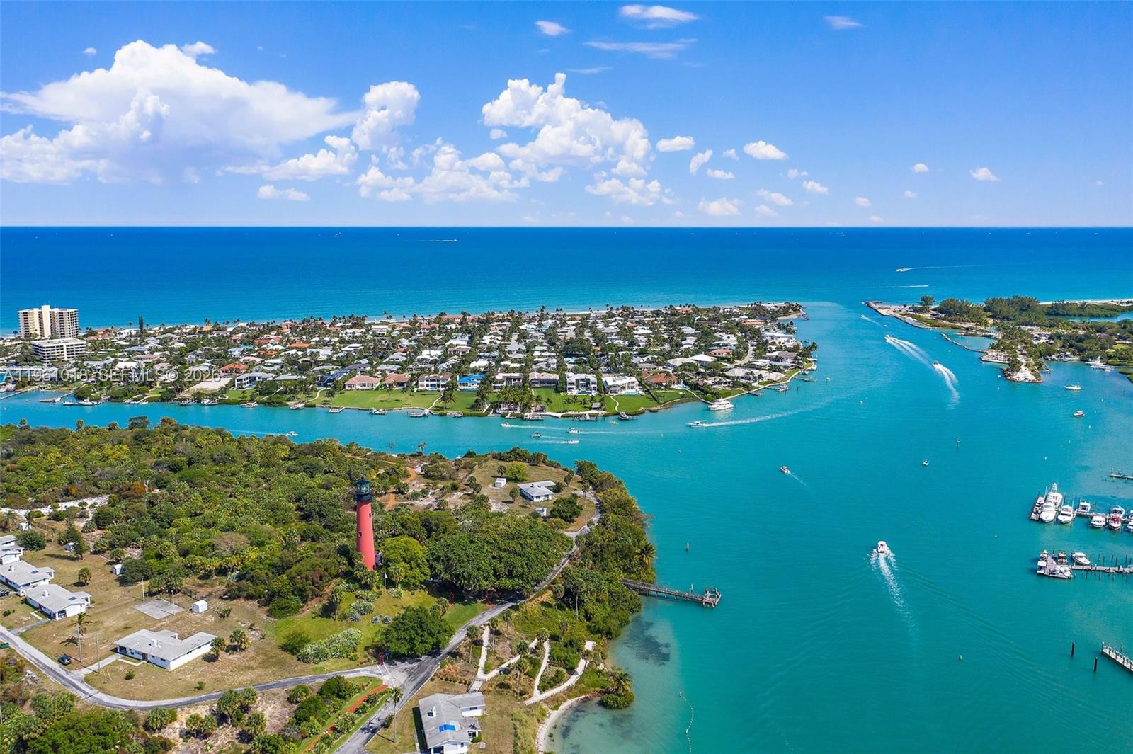 219 Colony Road Jupiter Inlet Colony, FL 33469 - Photo 27 of 33 a view of a city with an ocean