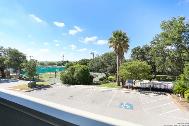a view of a street with cars park