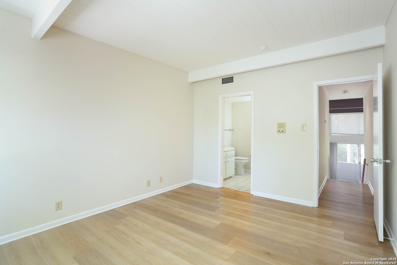 3102 Eisenhauer Road, Unit B16 San Antonio, TX 78209 - Photo 17 of 31 a view of empty room with wooden floor