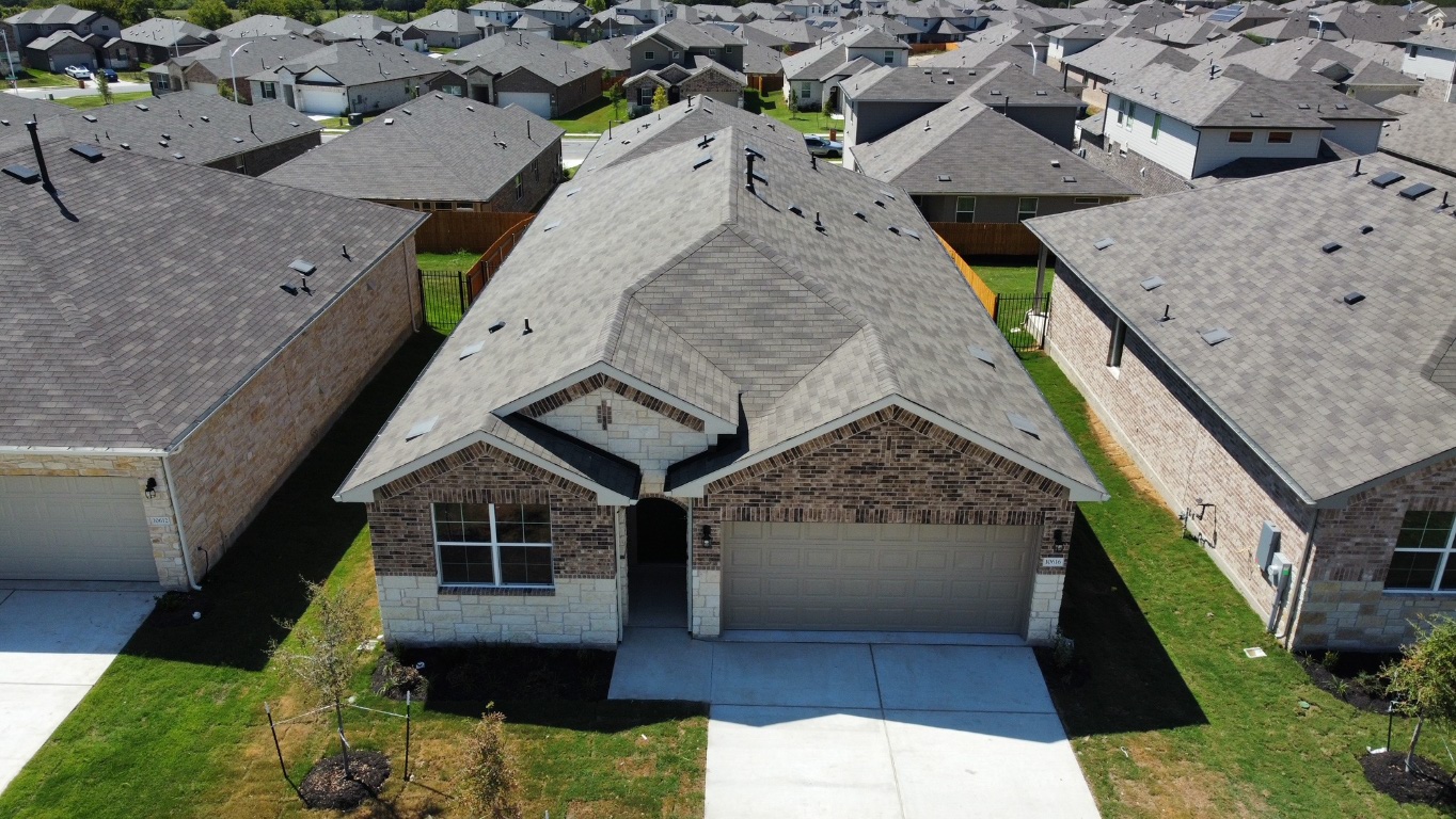10616 Defender Trail Austin, TX 78754 - Photo 2 of 25 an aerial view of a house with a yard