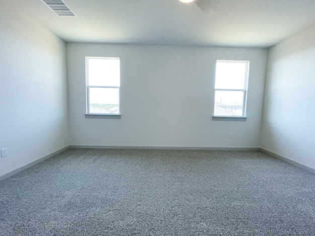 10616 Defender Trail Austin, TX 78754 - Photo 22 of 25 an empty room with a window