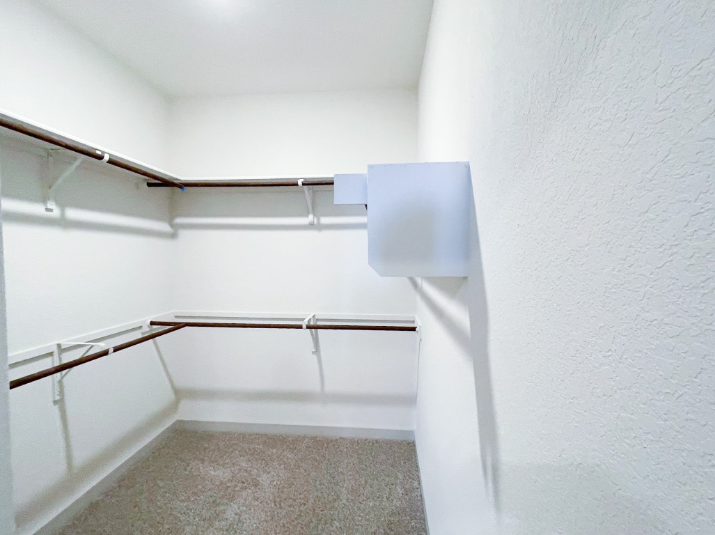10616 Defender Trail Austin, TX 78754 - Photo 25 of 25 Walk in closet with light carpet