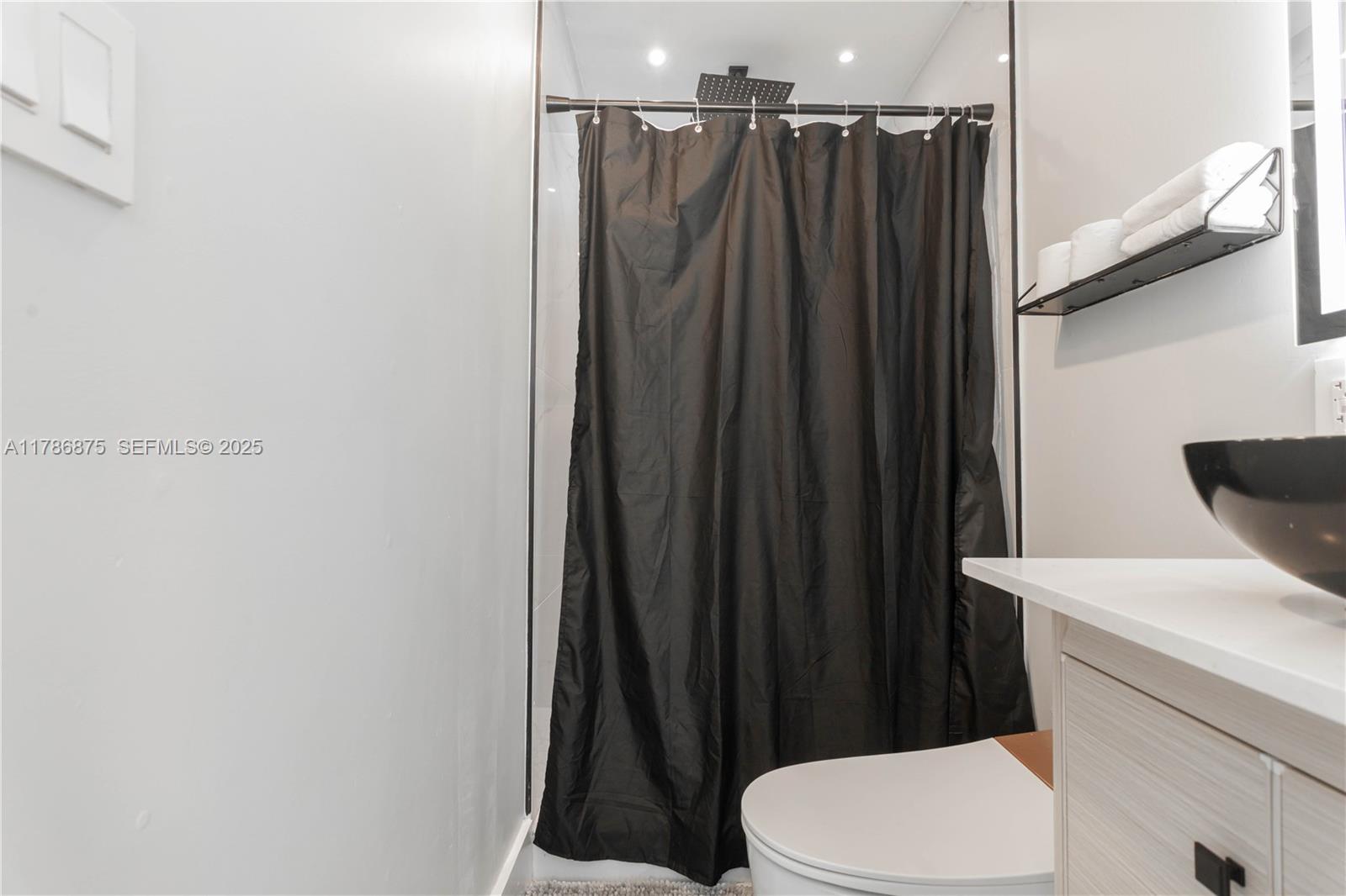 2360 Southwest 12th Street Miami, FL 33135 - Photo 31 of 78 a bathroom with a sink and a toilet