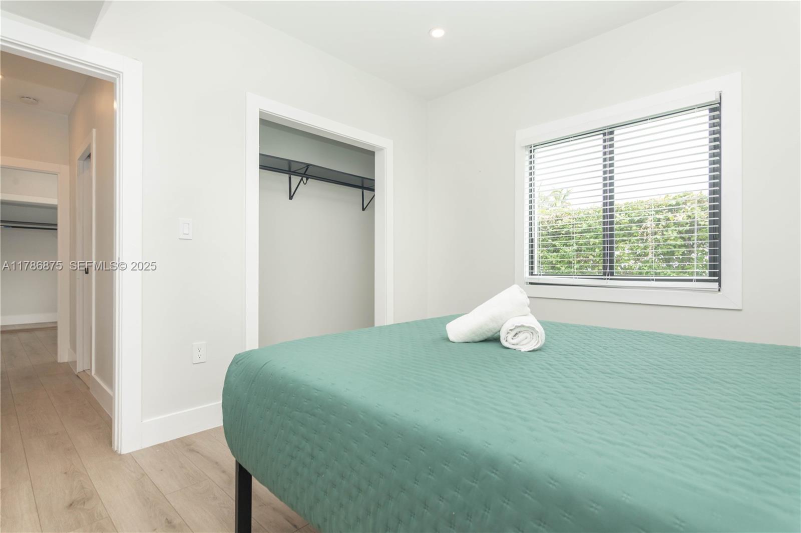 2360 Southwest 12th Street Miami, FL 33135 - Photo 58 of 78 a bedroom with a bed and window