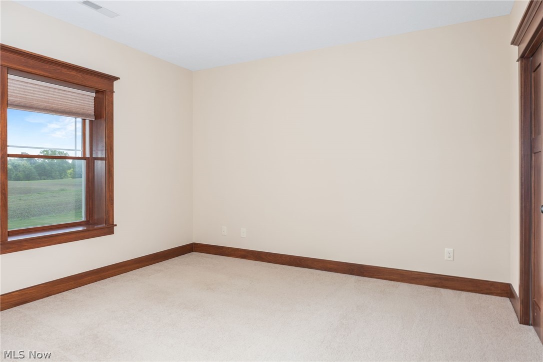 6925 River Styx Road Medina, OH 44256 - Photo 33 of 49 Neutral-toned walls and plush carpeting provide a versatile interior