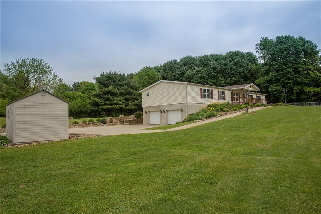 131 West Brewster Road Butler, PA 16001 - Photo 1 of 25 1.03 Acres of almost completely level yard surrounded by beautiful mature trees. Large level driveway can host a multitude of family functions and cookouts! Shed stays with property.